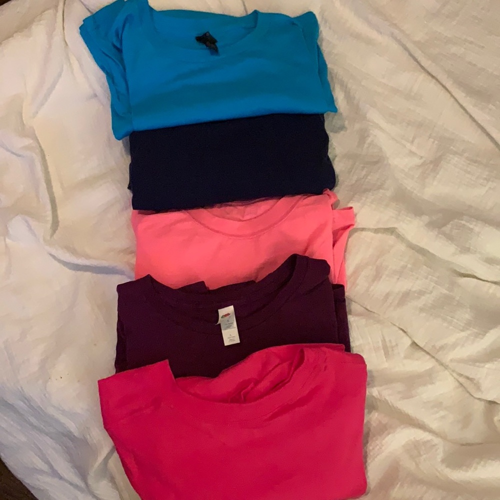 Assorted plain colored tees.